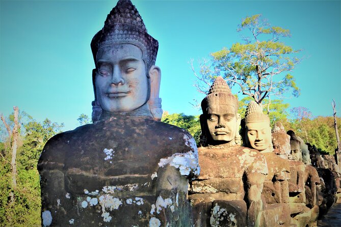 Angkor Wat Highlights and Sunrise Guided Tour from Siem Reap - Bayon Temple: The Faces You Can’t Unsee