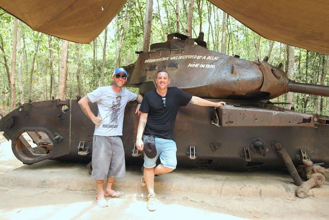Cu Chi Luxury Group Tour - Tapioca and Cake Half Day - Walking the tunnels: trapdoors, storage spaces, and real constraints