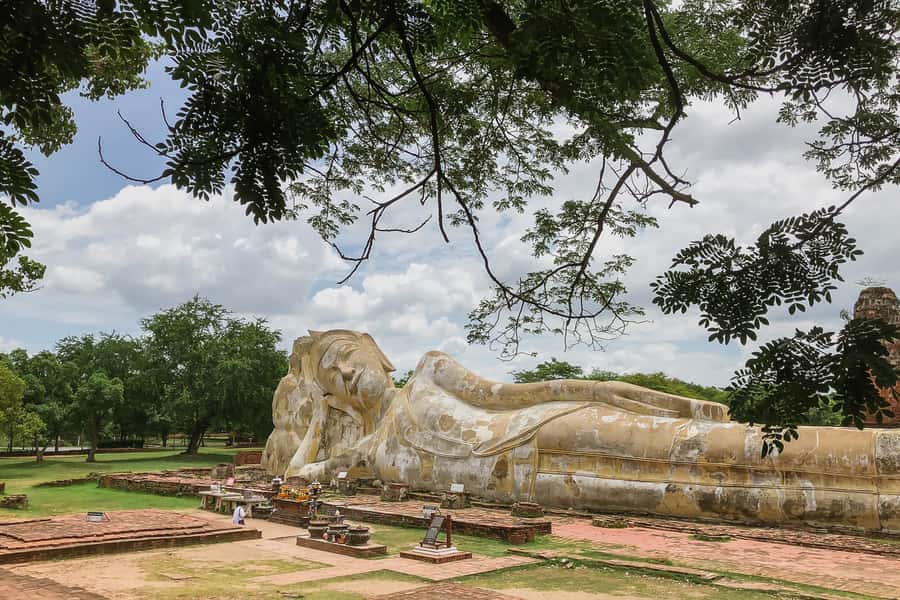 From Bangkok: Ayutthaya Day Tour by Bus with River Cruise - Getting To Ayutthaya: Early Pickup, Air-Con Comfort, and Temple-Ready Clothes