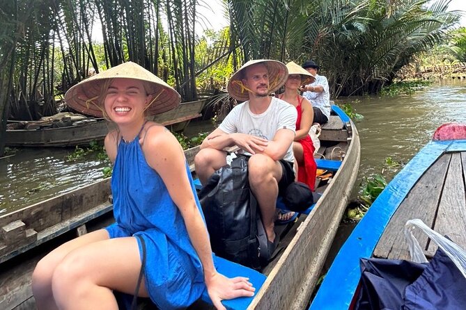 From HCM City: Mekong Delta Tour with Sampan Journey - Sampan cruising: why coconut-lined canals feel different