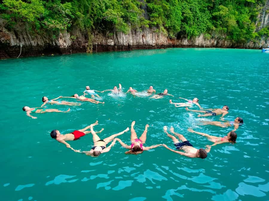 From Krabi: Phi Phi Early Bird & 4 Islands by Speedboat - Chicken Island photo stop: short, silly, and satisfying