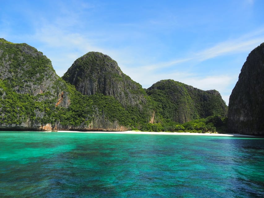 From Krabi: Phi Phi Islands Speedboat Day Tour - Viking Cave and Monkey Beach: quick passes with cool stories