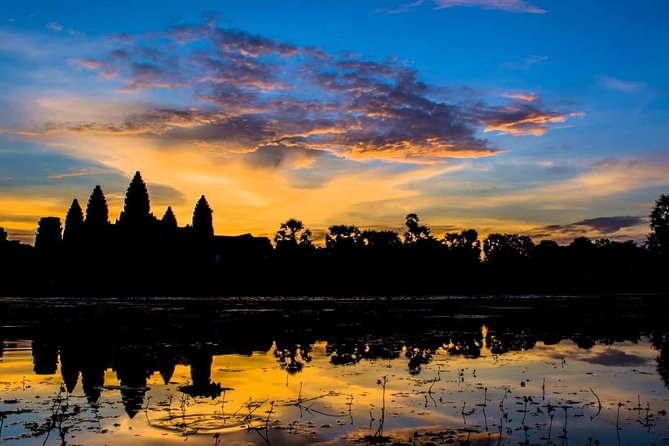 Full-Day Angkor Wat Sunrise Private Tour with Guide from Siem Reap - Angkor Wat at sunrise: main entrance climbs and first-light views
