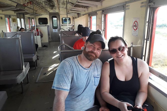 Half-Day Railway Market and Floating Market Tour in Thailand - Damnoen Saduak Floating Market: Longtail Boat, Canal Life, and Photos