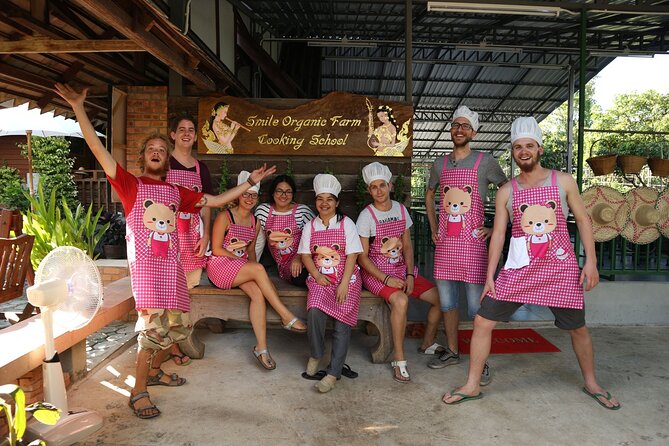 Half-Day Thai Cooking Class at Organic Farm in Chiang Mai - Entering Smile Organic Farm: The Herb Garden and Organic Kitchen Setup