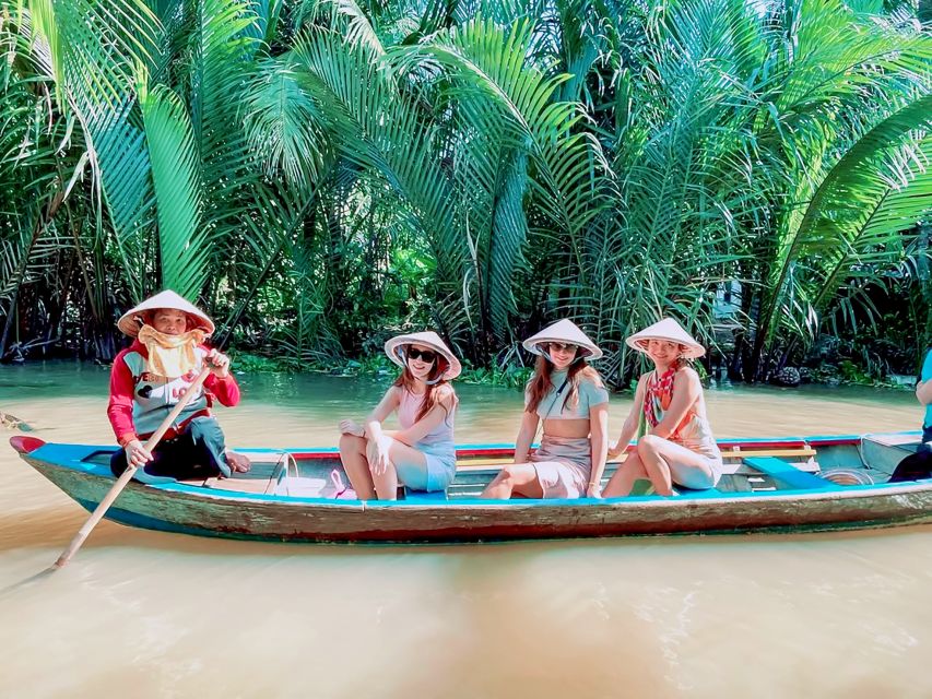 HCM: Cu Chi Tunnels & Mekong Delta with Coconut Village Tour - Coconut village canals: sampans, honey tea, and folk music