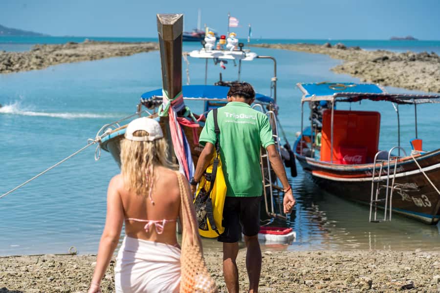 Koh Samui: Island Hopping Adventure in Coral and Pig Island - Starting at Thong Krut Pier: safety briefing and your first boat ride