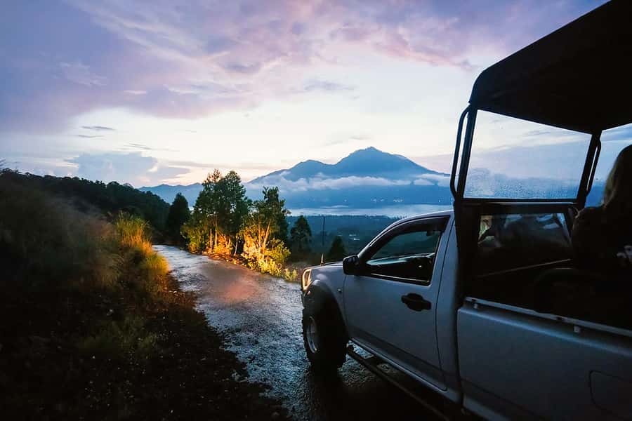 Mount Batur: Sunrise Jeep Tour & Natural Hot Spring - Eruption stories at the stops: 1964 lava flow and an active volcano view