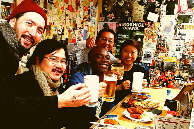 Osaka Food Tour: 13 Dishes at 5 Local Eateries - The Osaka flavors and drinks: gyoza, takoyaki, kitsune udon, and local sips