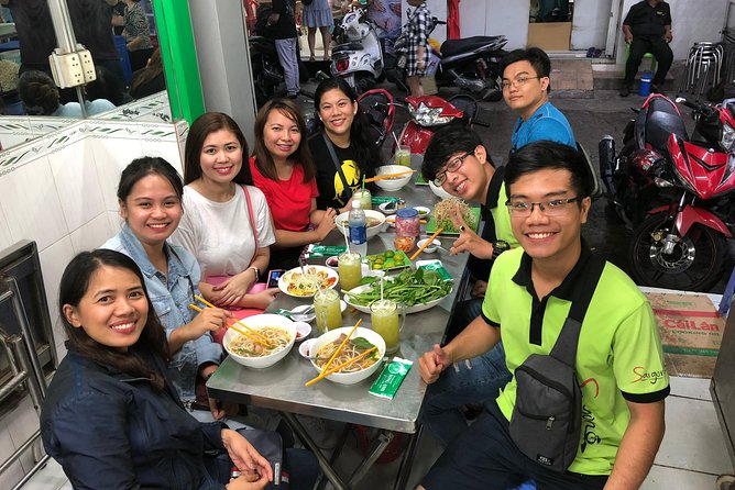 Saigon By Night and Street Food By Motorbike | Opt: Ao Dai Riders - Stop 2: Ho Thi Ky Flower Market Oysters and Quail Egg Toppers