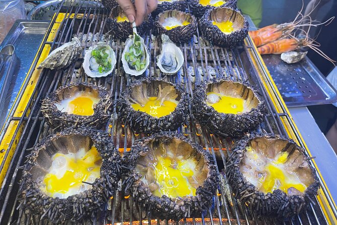 Saigon By Night and Street Food By Motorbike | Opt: Ao Dai Riders - Stop 4: Nguyen Van Cu Bridge Views Over the Saigon River